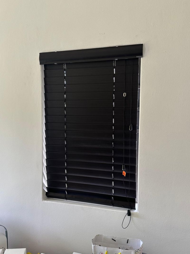 Black venetian blinds